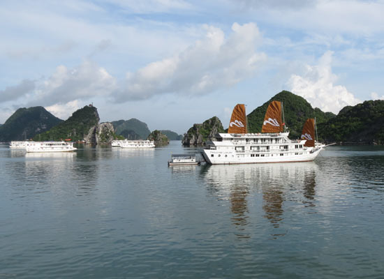 Experience the serene magic of world famous Halong Bay with 2 days 1 night onboard